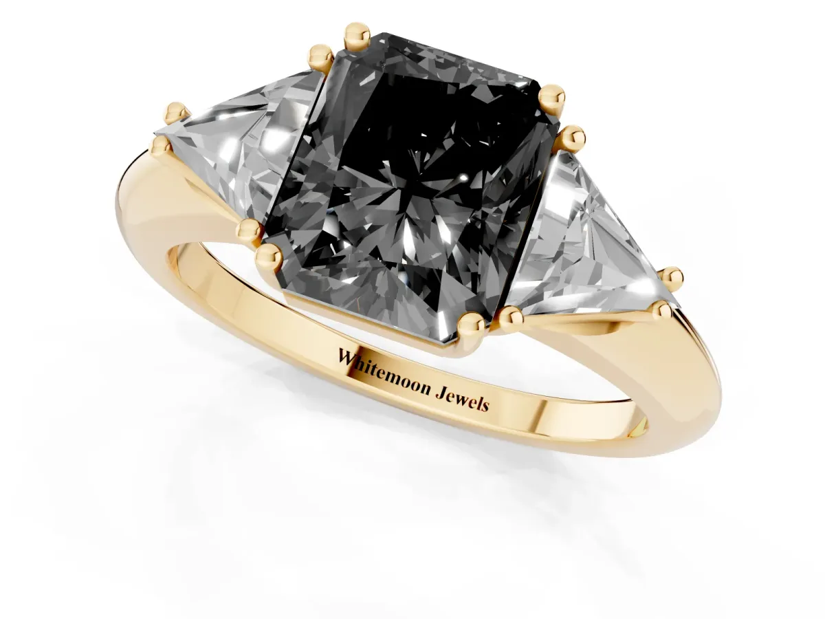 Fancy Black Three-Stone Radiant Cut Diamond Engagement Ring with Trillion Side Stones and Prong Setting Yellow gold