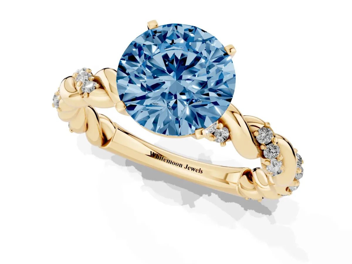 Fancy Blue Round Cut Diamond Solitaire Ring with Twisted Band and Pavé Accents Yellow gold