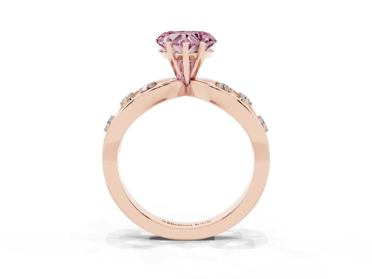 Fancy Pink Heart Cut Cut Solitaire Diamond with Side Stones on Criss-Cross Band and Four-Prong Setting Rose gold