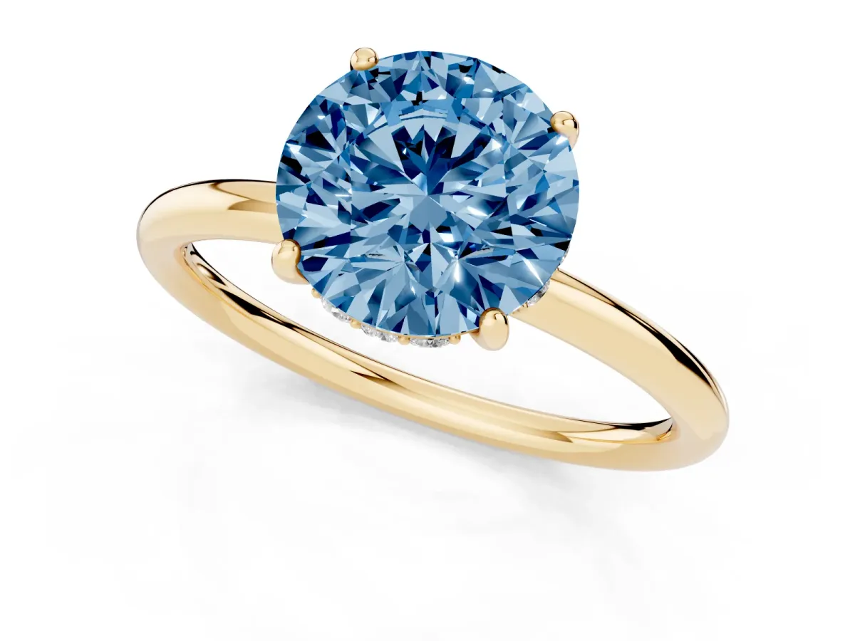 Fancy Blue Round Cut Solitaire Diamond Ring with a Classic Band and Four-Prong Setting Yellow gold