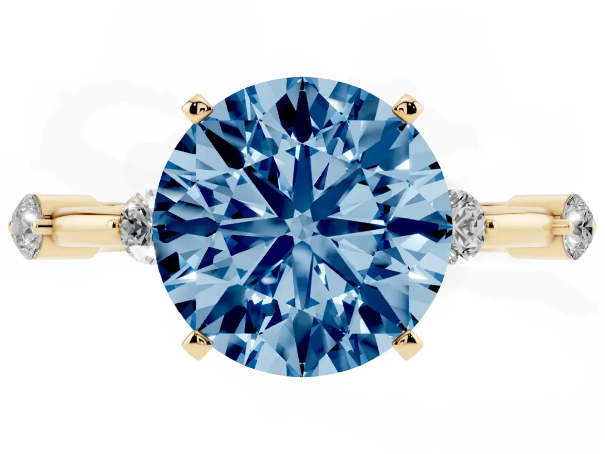 Fancy Blue Round Cut Solitaire Diamond Ring with Bezel Set Side Stones and Prong Setting Yellow gold