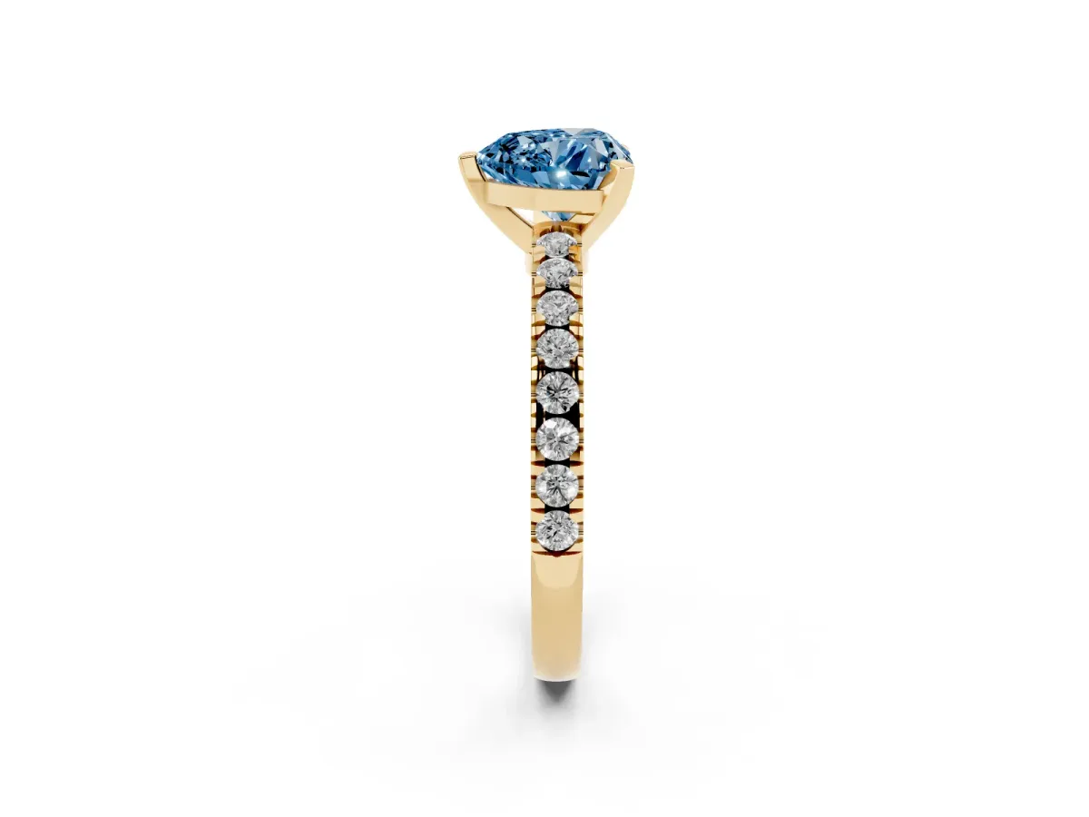 Fancy Blue Heart Cut Solitaire Diamond with Pavé Band and Four-Prong Setting Yellow gold