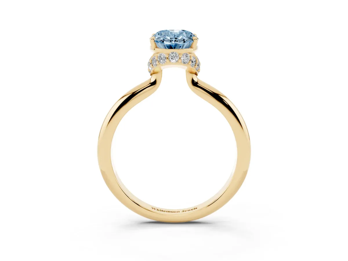 Fancy Blue Oval Cut Brilliant Solitaire Engagement Ring with Six-Prong Setting and Classic Band Yellow gold