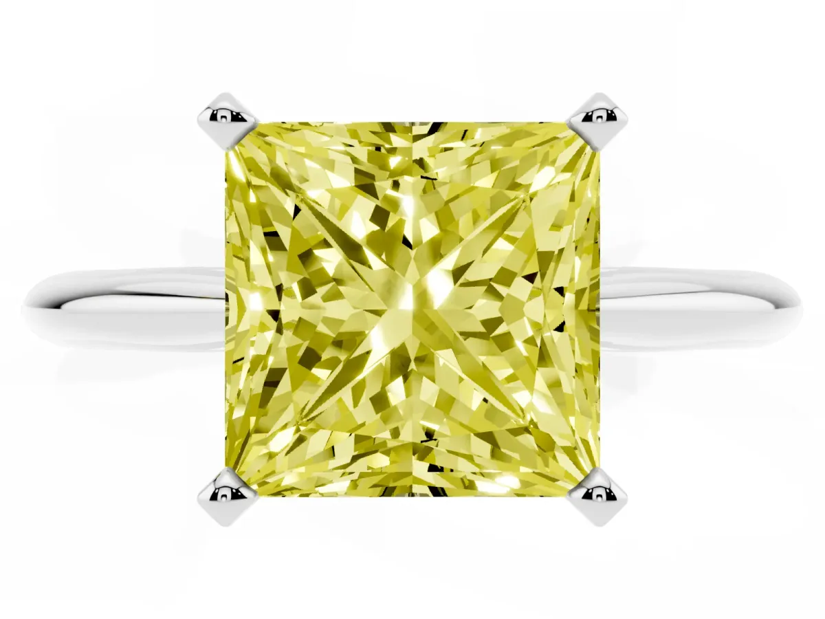 Fancy Yellow Princess Cut Cut Solitaire Ring with Four-Prong Setting on a Classic Band Silver
