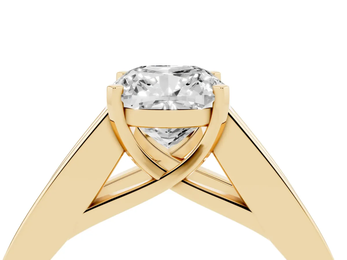 Cushion Cut Cut Channel Set Solitaire Ring with Four-Prong Setting Yellow gold