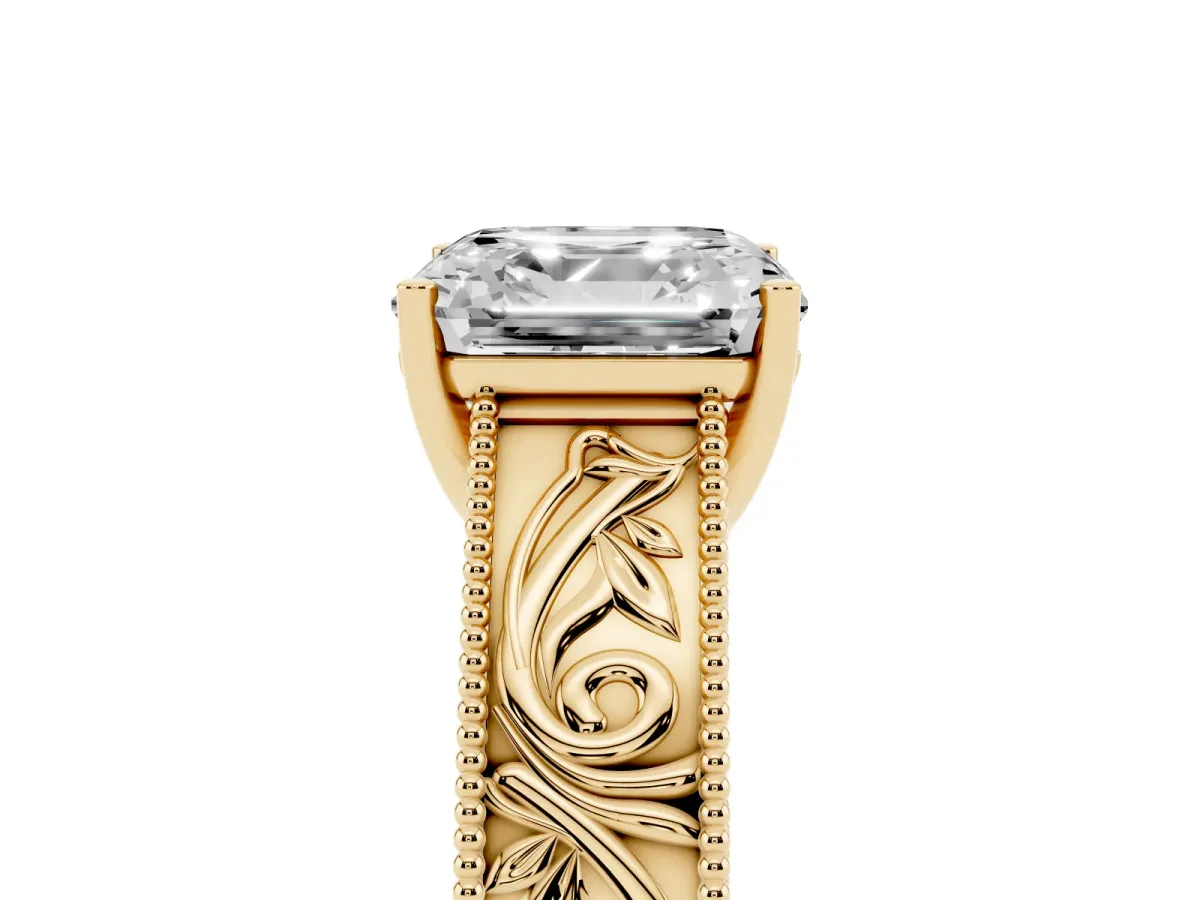 Asscher Cut Diamond Solitaire Ring with Engraved Band and Four-Prong Setting Yellow gold