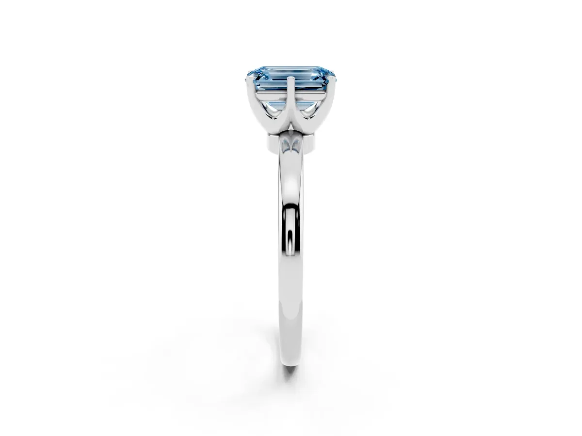 Fancy Blue Emerald Cut Solitaire Diamond Ring with Six-Prong Setting on a Classic Band Platinum