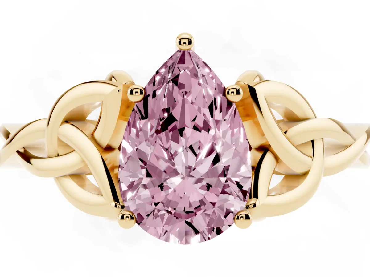 Fancy Pink Pear Cut Diamond Solitaire Engagement Ring with Celtic Knot Band and Four-Prong Setting Yellow gold