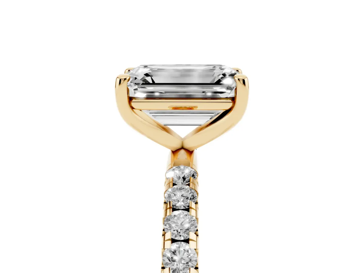 Emerald Cut Cut Diamond Solitaire Ring with Micro Pave Band and Four Prong Setting Yellow gold