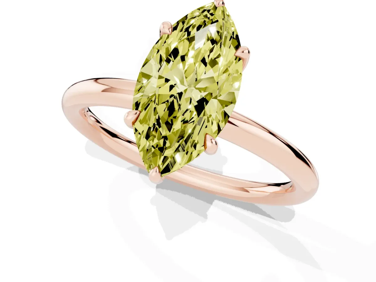 Fancy Yellow Marquise Cut Diamond Solitaire Ring with Thin Band and Four-Prong Setting Rose gold