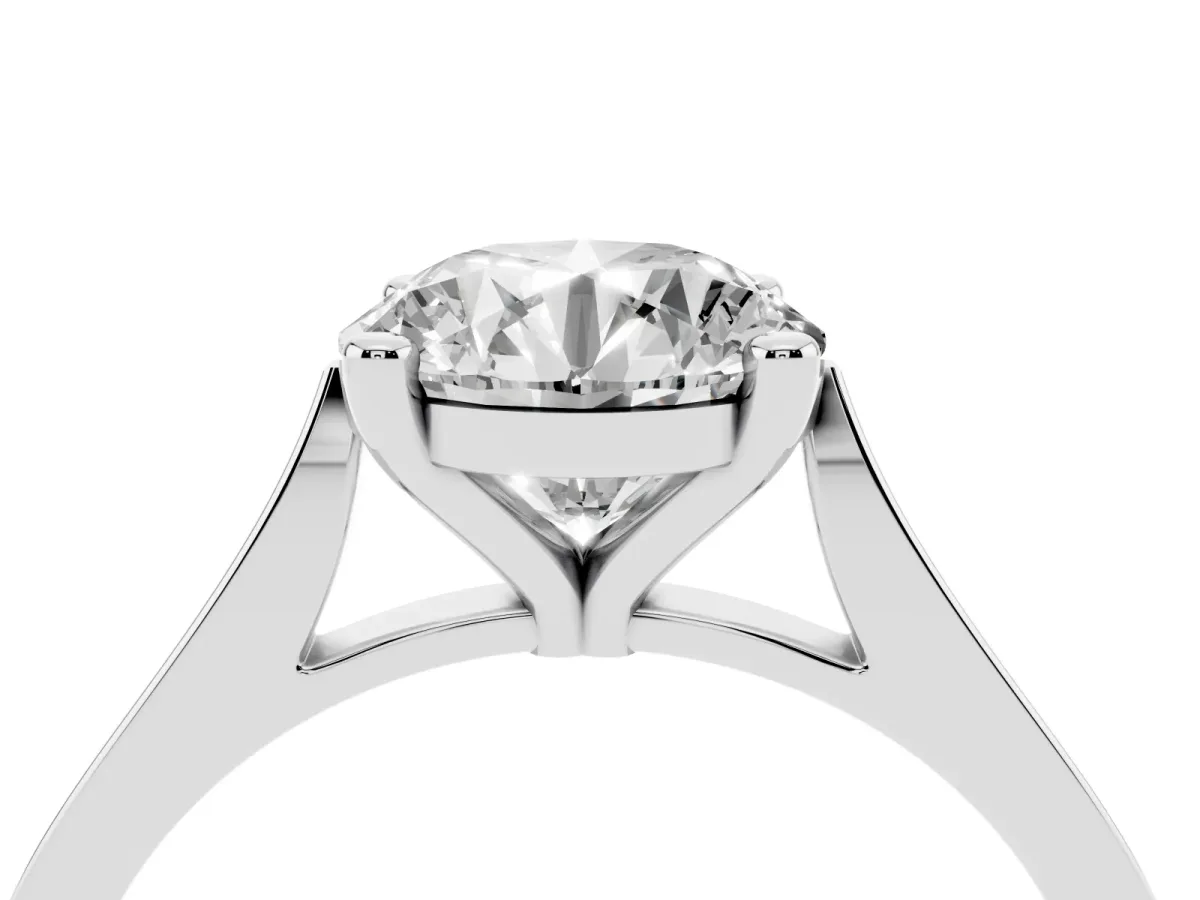 Round Cut Solitaire Diamond Ring with Four-Prong Setting and Tapered Band Platinum