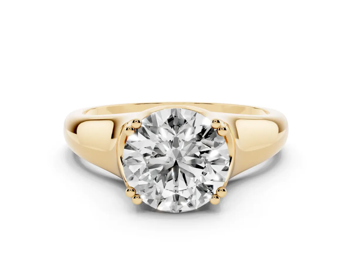 Round Cut Diamond Solitaire Ring with Wide Band and Prong Setting Yellow gold