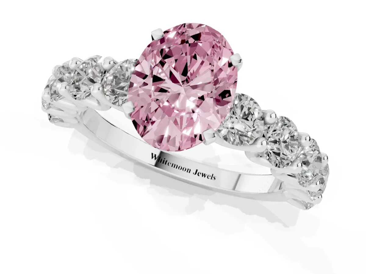 Fancy Pink Oval Cut Diamond Prong Setting with Side Stones on a Pave Band Silver