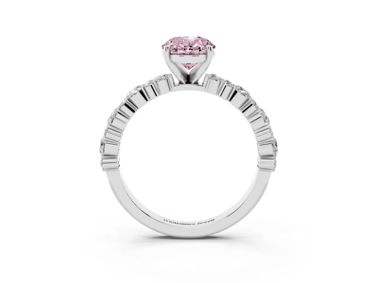 Fancy Pink Oval Cut Diamond Side Stone Solitaire Ring with Round and Four-Prong Setting Platinum