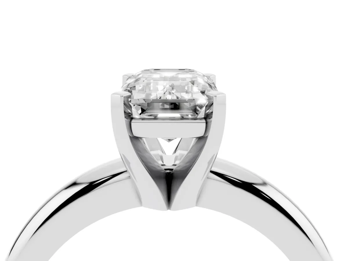 Emerald Cut Diamond Solitaire Engagement Ring with Round Band and Four-Prong Setting Silver