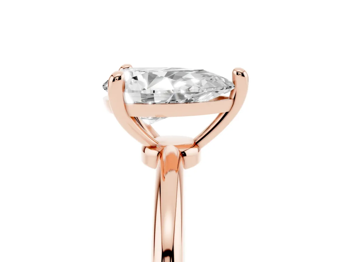 Pear Cut Solitaire Diamond Ring with 4-Prong Setting on a Classic Band Rose gold