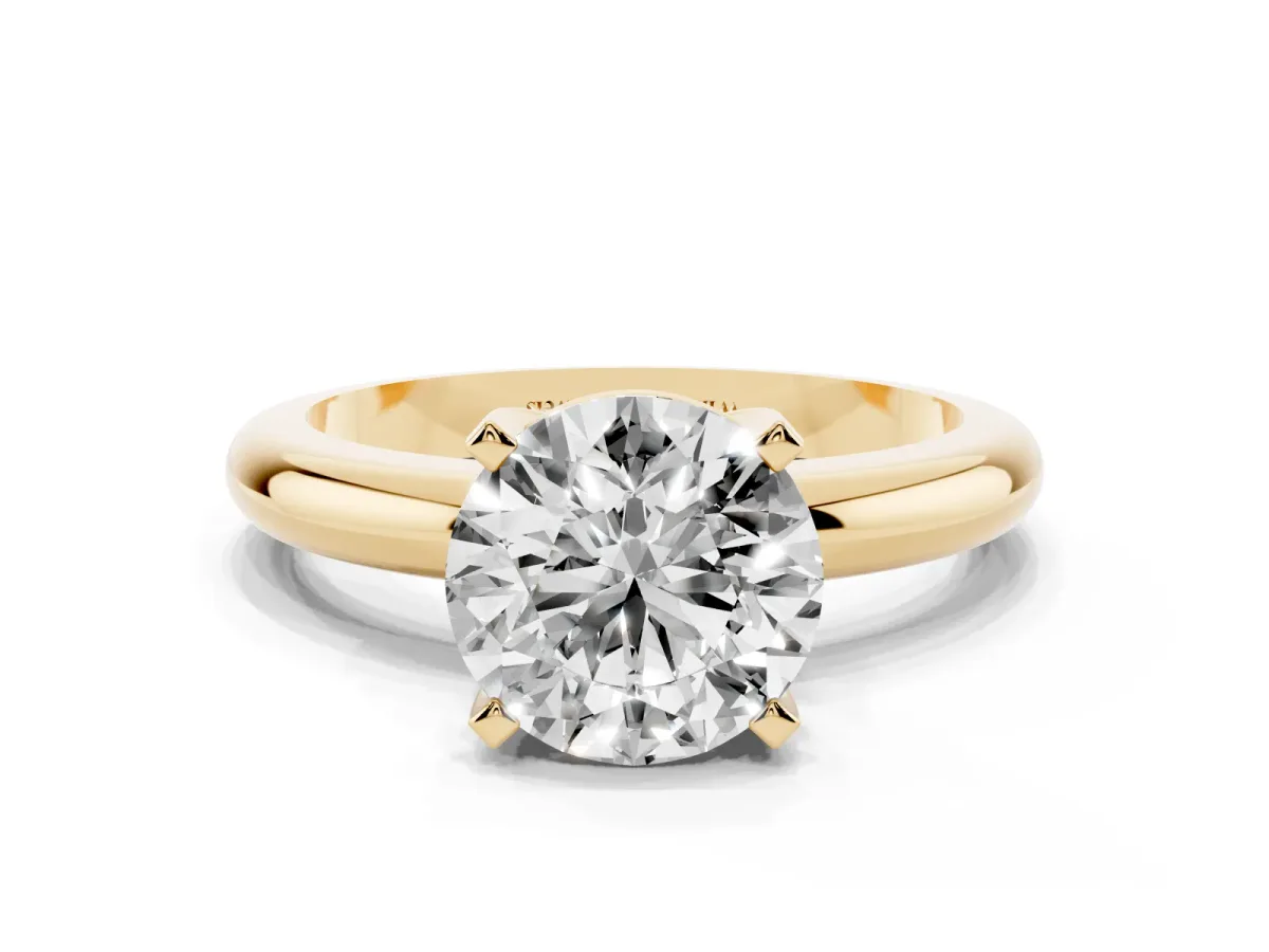 Round Cut Diamond Solitaire Engagement Ring with Round Band and Four-Prong Setting Yellow gold