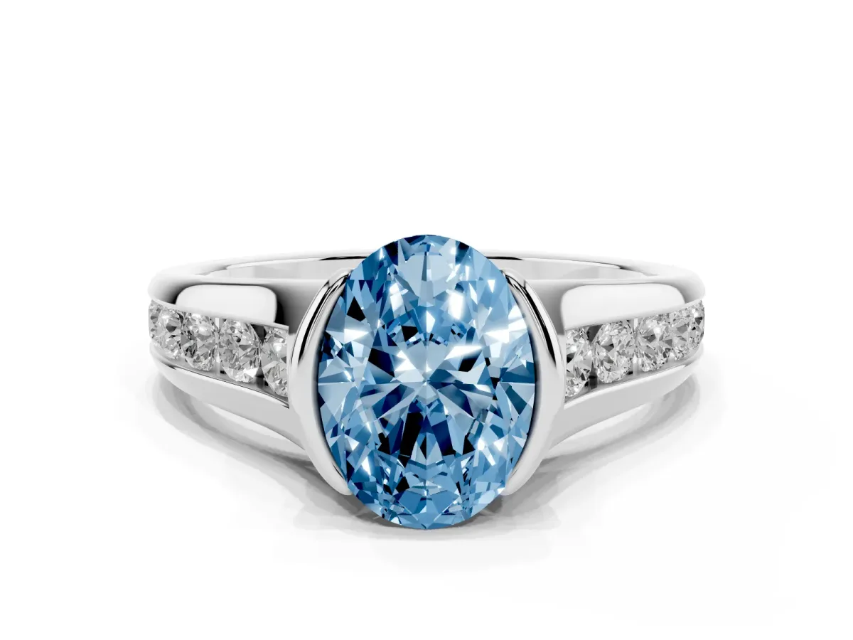Fancy Blue Oval Cut Solitaire Bezel-Set Diamond Ring with Channel-Set Band Platinum