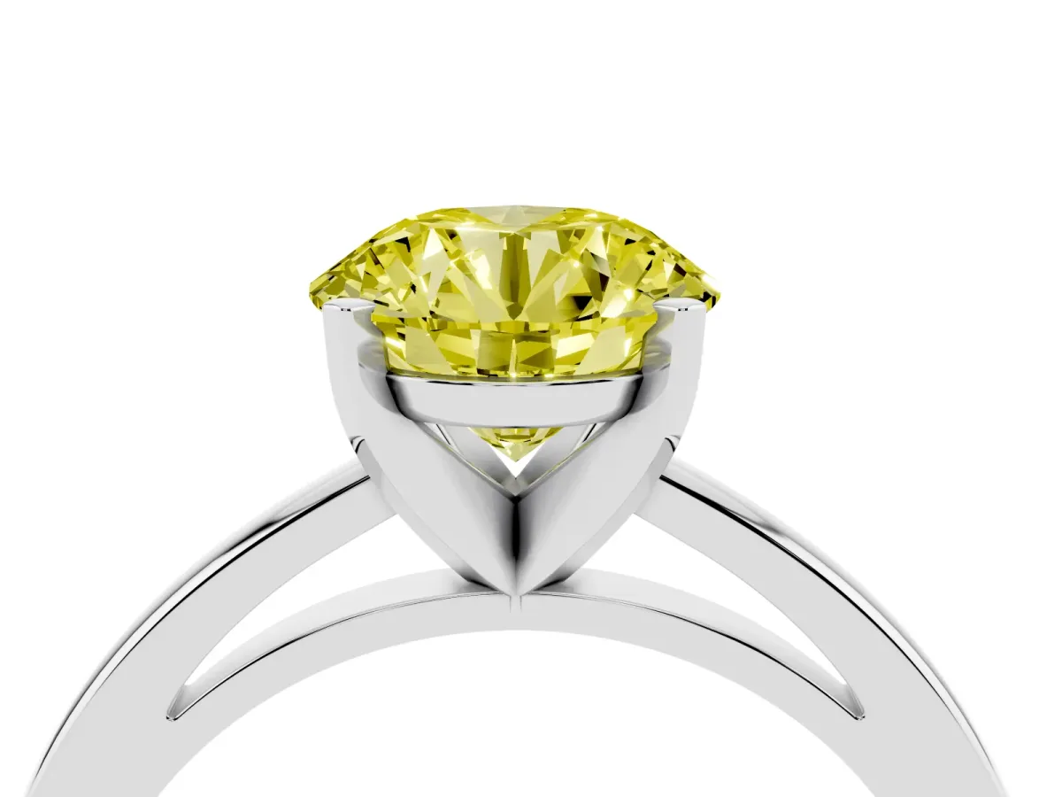 Fancy Yellow Round Cut Solitaire Diamond Engagement Ring with Four-Prong Setting on a Classic Band Platinum