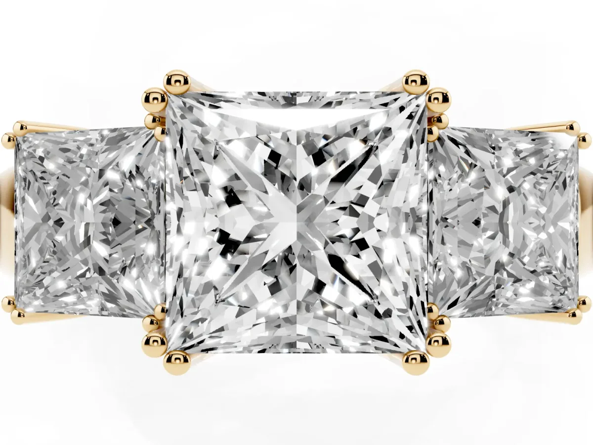 Three-Stone Princess Cut Cut Diamond Ring with Channel Set Band and Four-Prong Setting Yellow gold
