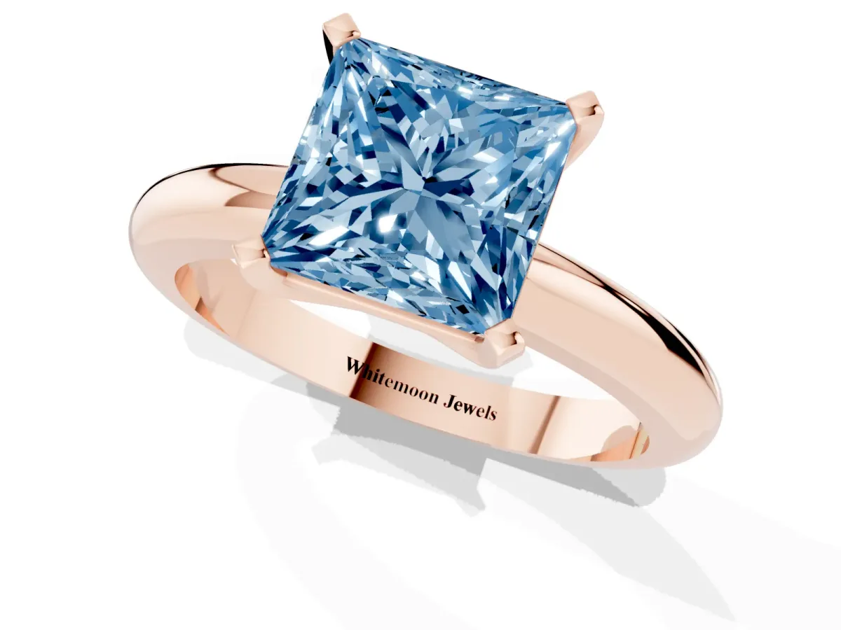 Fancy Blue Princess Cut Diamond Solitaire Engagement Ring with Round Band and Four-Prong Setting Rose gold
