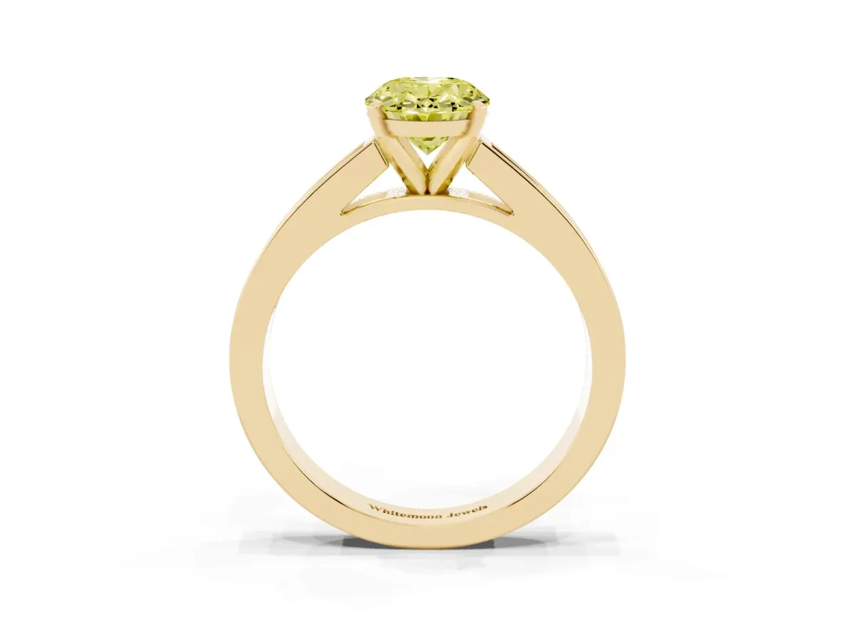 Fancy Yellow Oval Cut Solitaire Diamond Ring with Channel-Set Band and Four-Prong Setting Yellow gold