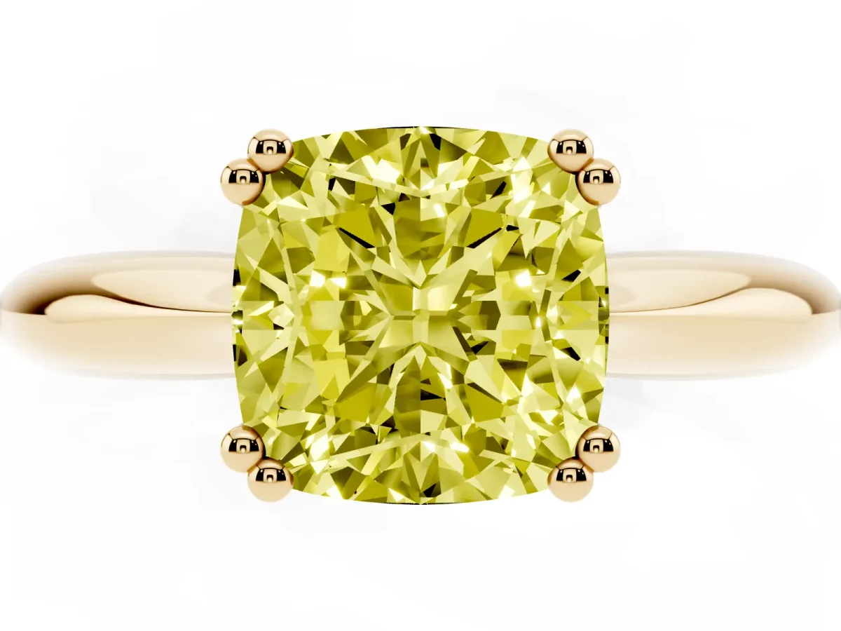 Fancy Yellow Cushion Cut Cut Solitaire Engagement Ring with Tapered Band and Four-Prong Setting Yellow gold