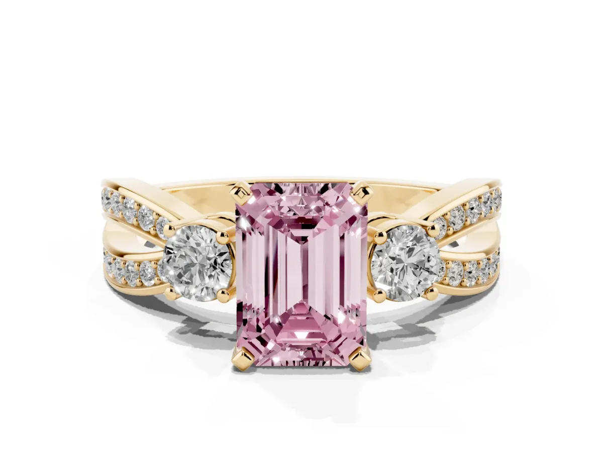 Fancy Pink Three-Stone Emerald Cut Cut Diamond Twist Band with Prong Setting Yellow gold