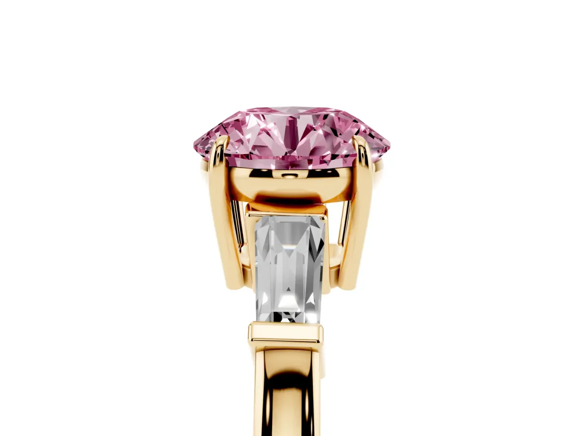 Fancy Pink Round Cut Diamond Three-Stone Ring with Tapered Baguette Side Stones and Prong Setting Yellow gold