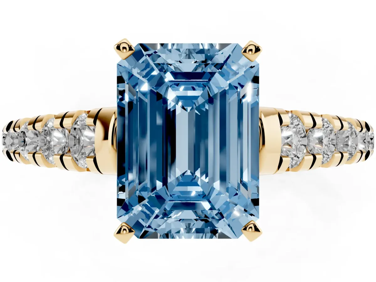 Fancy Blue Emerald Cut Diamond Cathedral Solitaire Ring with Round Pavé Band Yellow gold