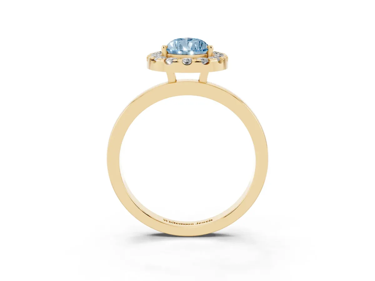 Fancy Blue Pear Cut Halo Diamond Solitaire with Pavé Band and Four-Prong Setting Yellow gold