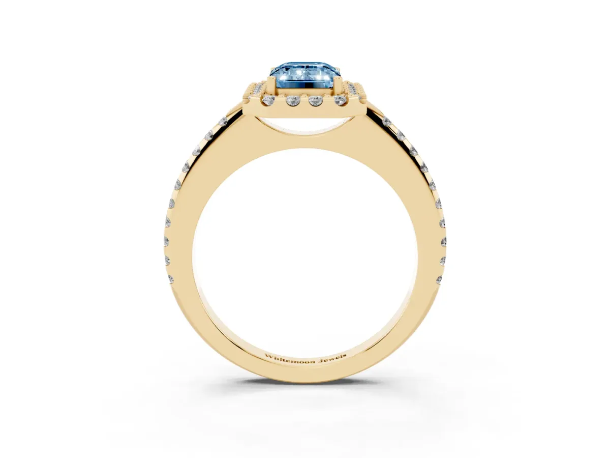 Fancy Blue Emerald Cut Diamond Pavé Halo Ring with Four-Prong Setting Yellow gold