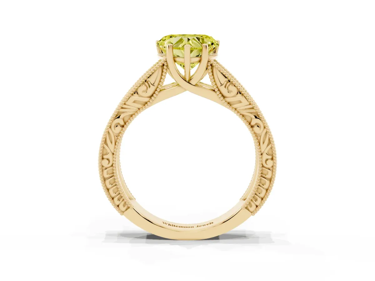 Fancy Yellow Heart Cut Diamond Solitaire Ring with Engraved Band and Four-Prong Setting Yellow gold