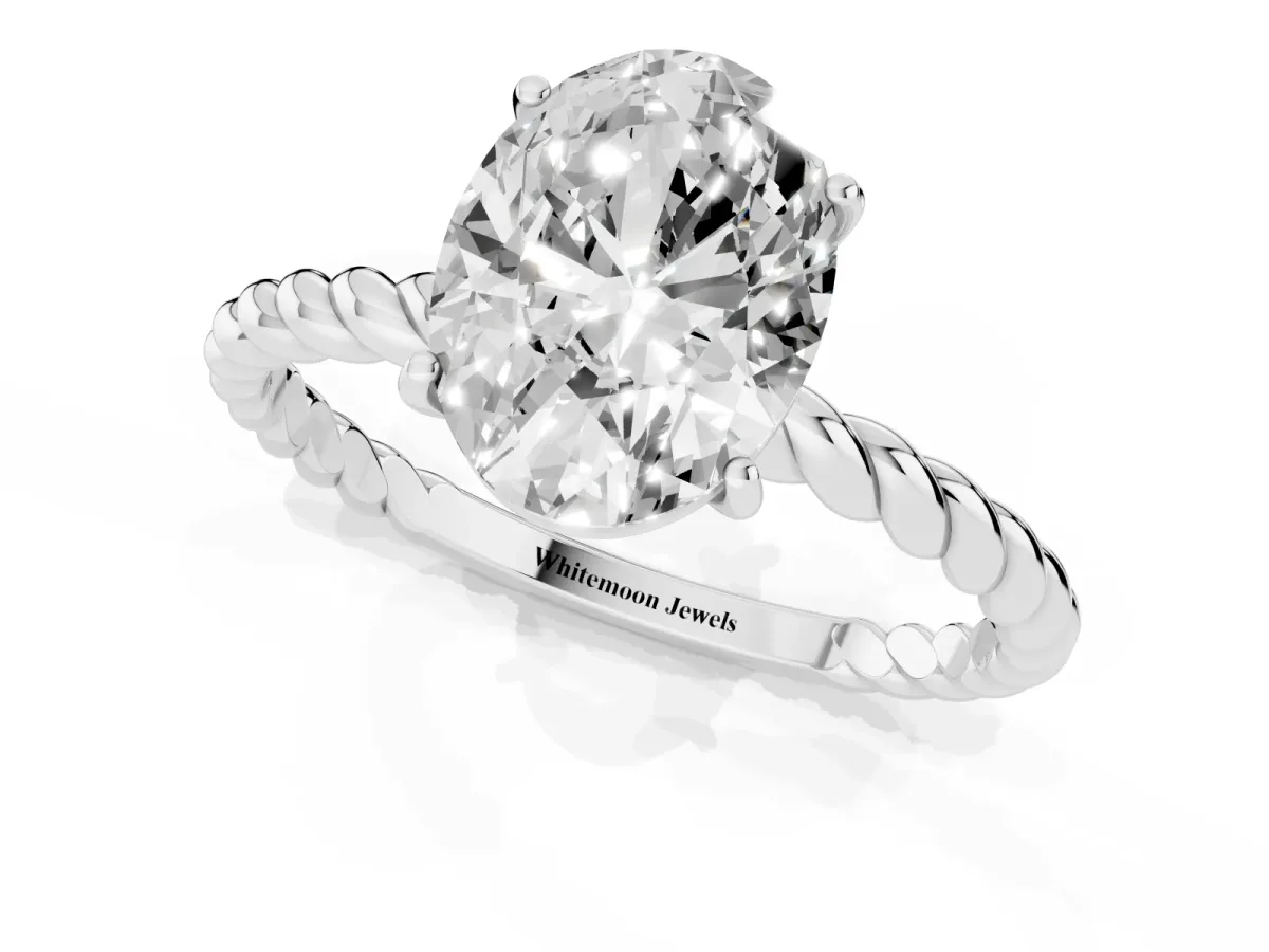 Oval Cut Solitaire Twist Band Ring with Four-Prong Setting Platinum