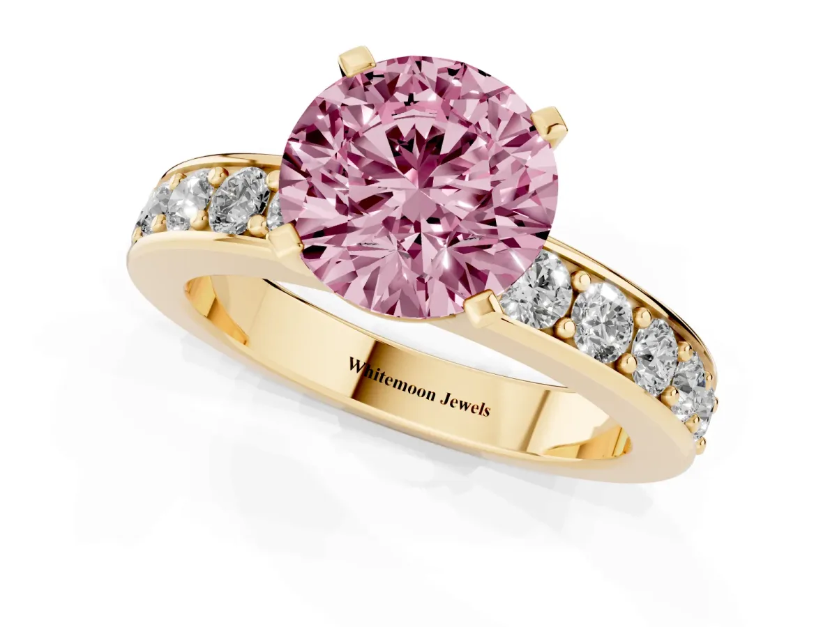 Fancy Pink Round Cut Diamond Engagement Ring with Channel Set Round Band and Prong Setting Yellow gold