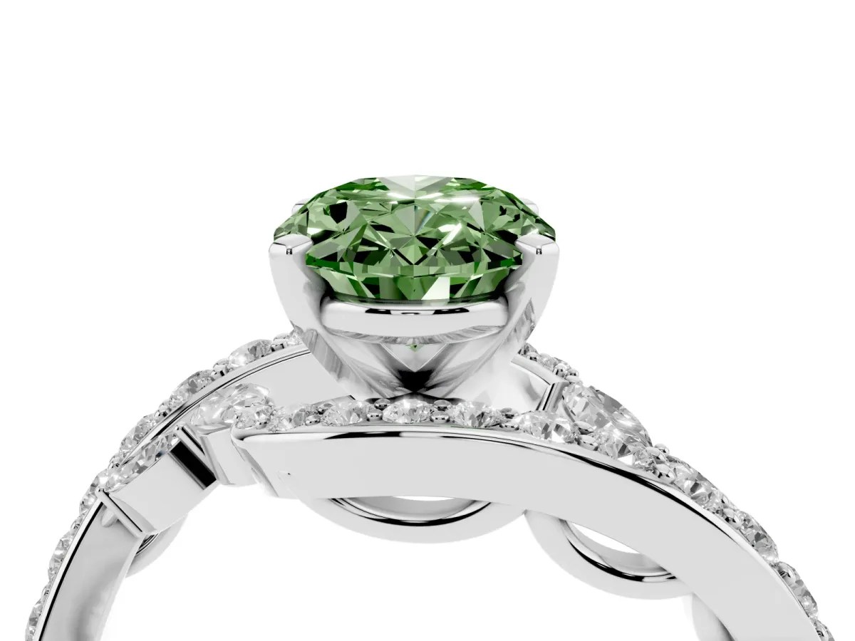 Fancy Green Oval Cut Solitaire with Pavé Twist Band and Four-Prong Setting Silver