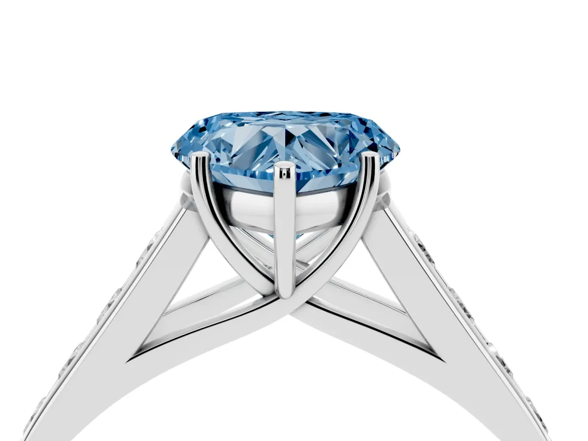 Fancy Blue Heart Cut Solitaire Channel-Set Diamond Engagement Ring with Four-Prong Setting Platinum