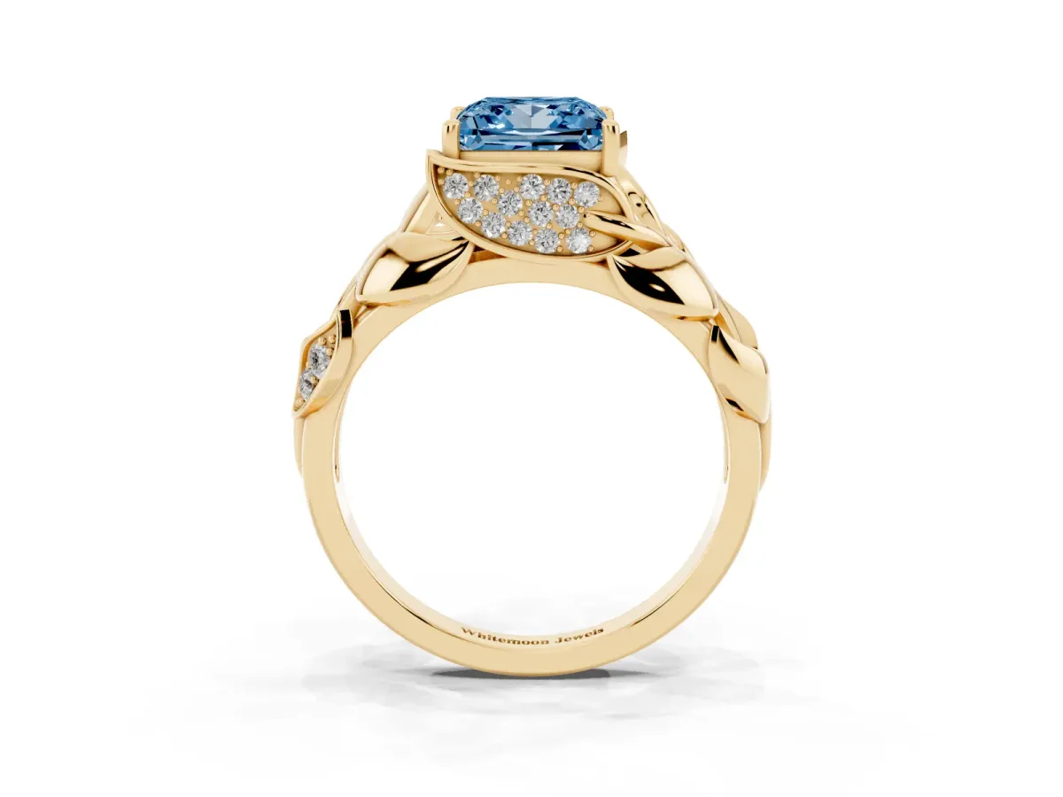 Fancy Blue Princess Cut Diamond Leaf-Inspired Engagement Ring with Round Accents and Prong Setting Yellow gold