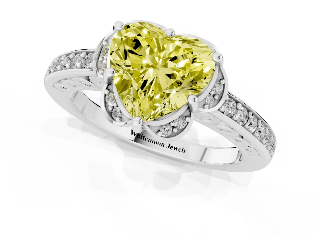 Fancy Yellow Heart Cut Cut Halo Diamond Ring with Channel Set Band and Four-Prong Setting White gold