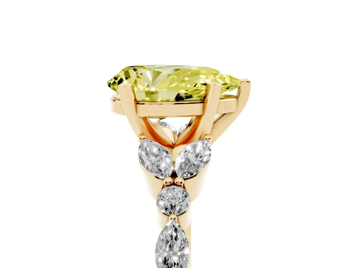 Fancy Yellow Pear Cut Diamond Solitaire Ring with Side Stones and Four-Prong Setting Yellow gold
