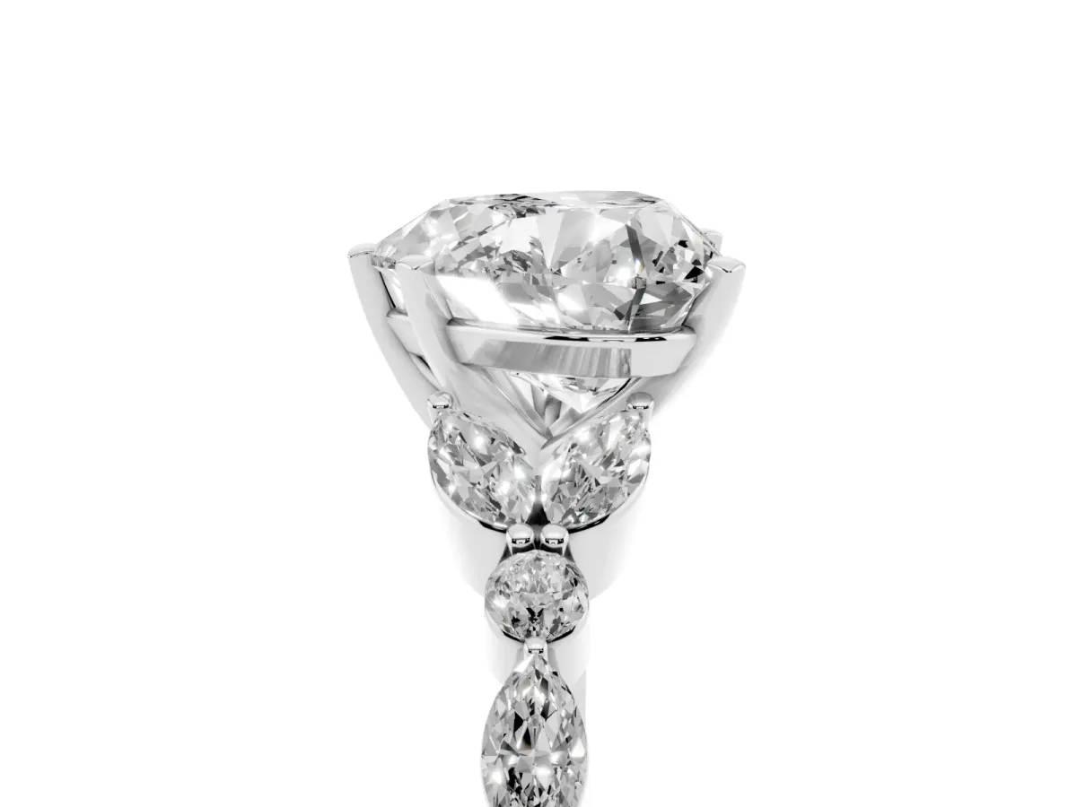Heart Cut Diamond Solitaire Ring with Side Stones and Four-Prong Setting Platinum