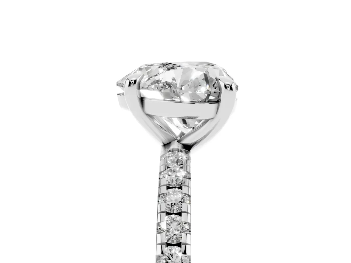 Heart Cut Diamond Brilliant Solitaire Ring with Pavé Band and Four-Prong Setting Silver