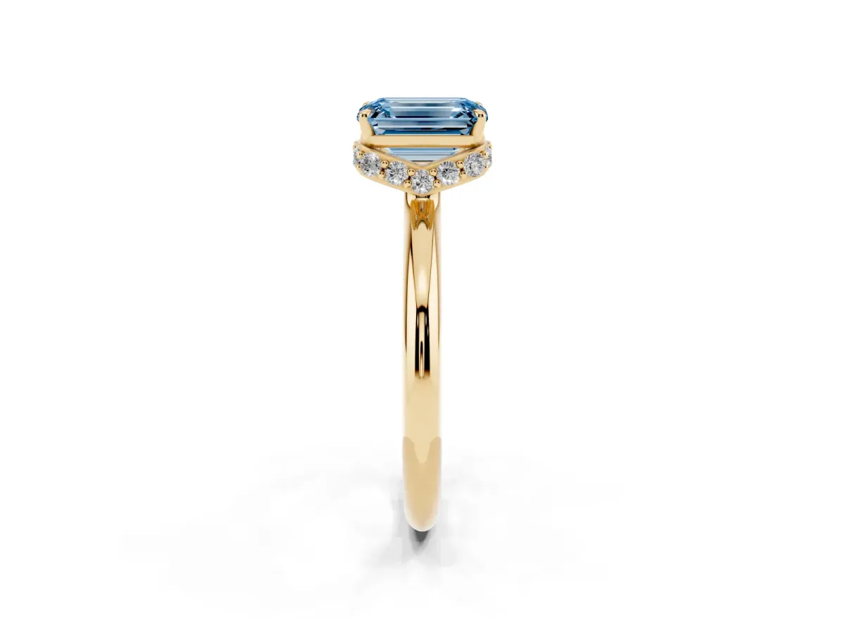 Fancy Blue Emerald Cut Brilliant Solitaire Engagement Ring with Six-Prong Setting and Classic Band Yellow gold