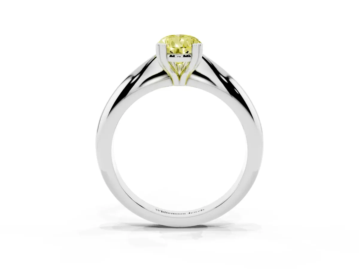 Fancy Yellow Pear Cut Cut Solitaire Engagement Ring with Tapered Band and Four-Prong Setting Silver