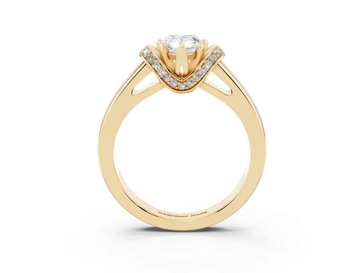 Pear Cut Solitaire Diamond Ring with Pave Band and Six-Prong Setting Yellow gold