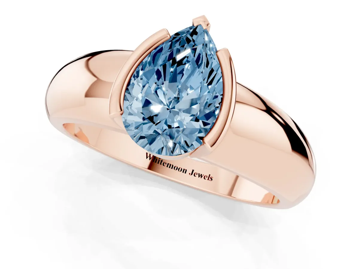 Fancy Blue Pear Cut Solitaire Tension Set Diamond Ring with Wide Band Rose gold