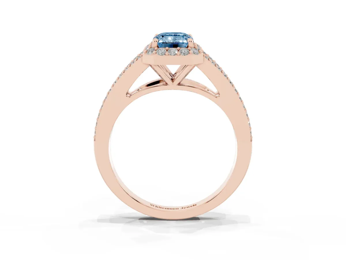 Fancy Blue Emerald Cut Halo Split Shank Pave Diamond Ring with Four-Prong Setting Rose gold