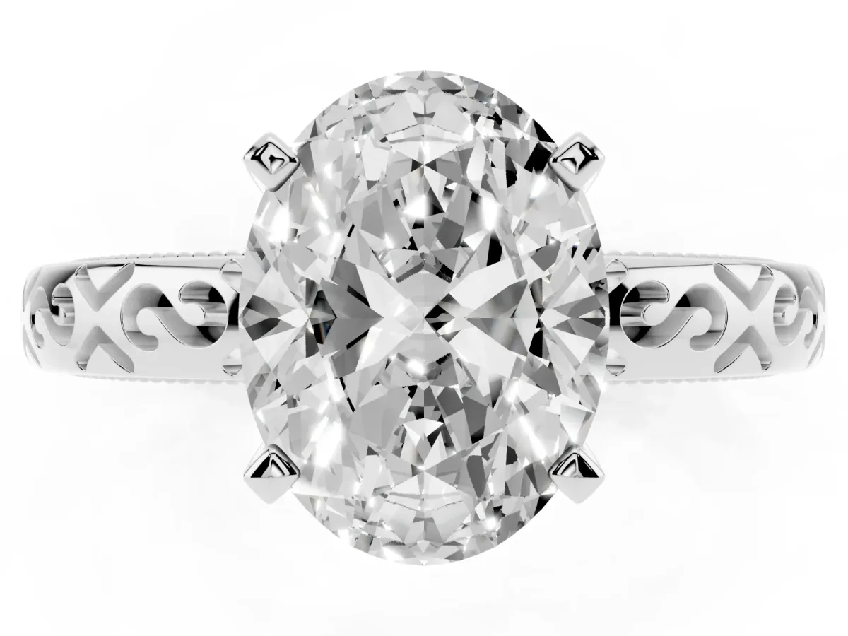 Oval Cut Solitaire Engagement Ring with Scrollwork Band and Four-Prong Setting White gold