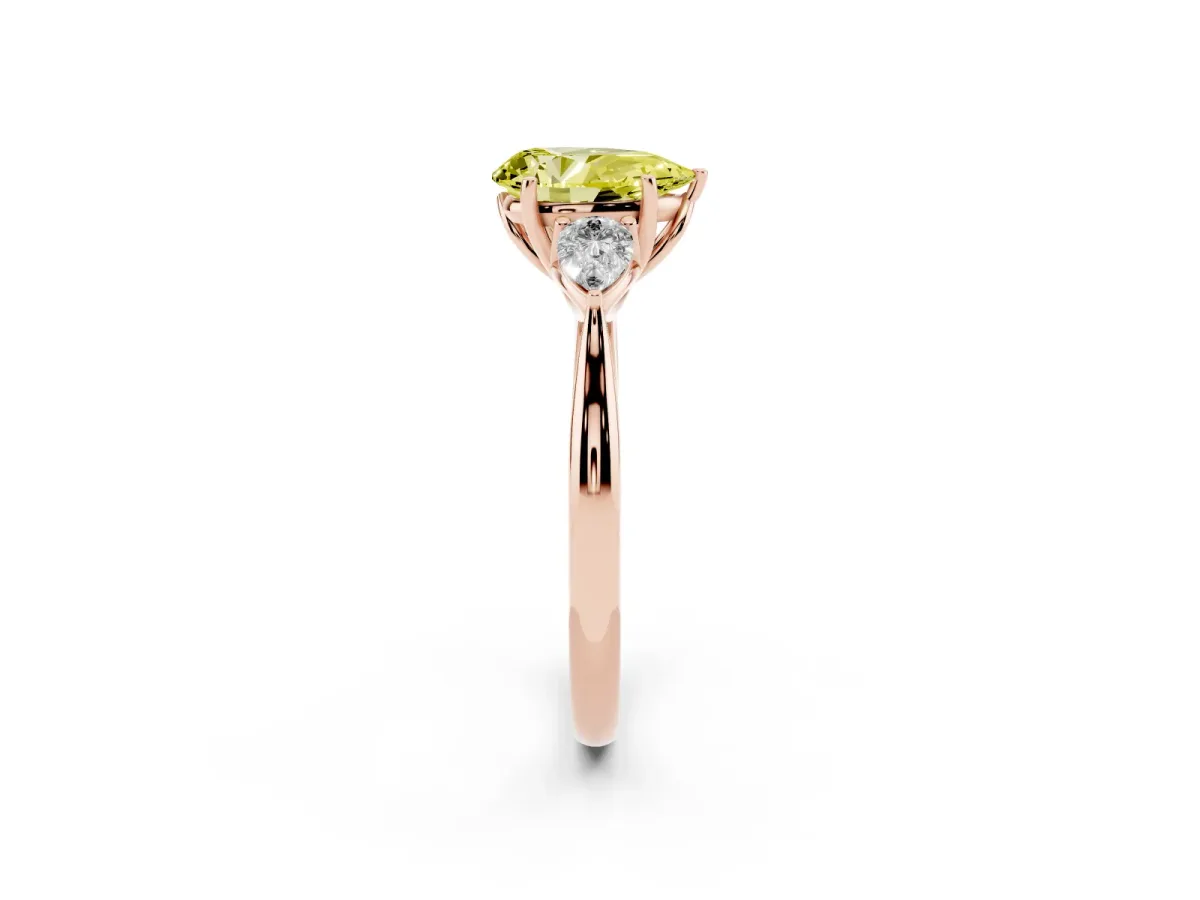 Fancy Yellow Three-Stone Pear Cut Brilliant Diamond Solitaire Ring with Tapered Band and Four-Prong Setting Rose gold