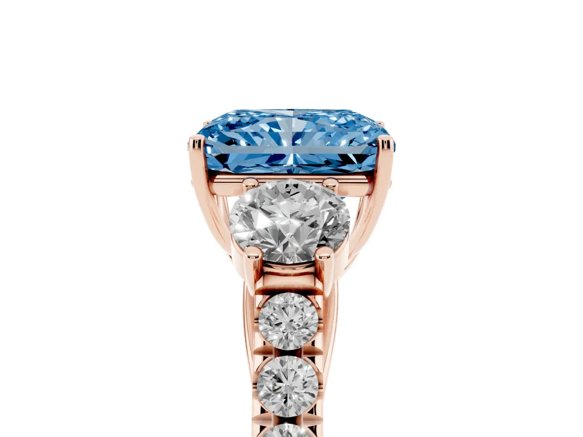 Fancy Blue Radiant Cut Cut Diamond Three-Stone Ring with Round Side Stones and Pavé Band Rose gold